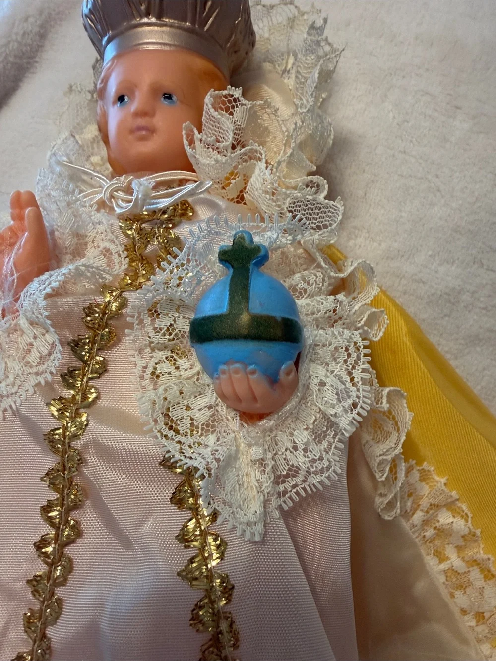 Vintage infant Jesus of Prague with light